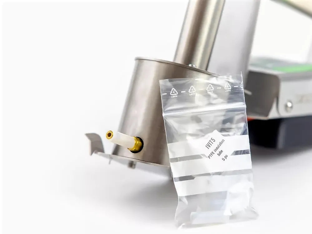 InstantVap PTFE insulation tube fitted over a brass vaporiser outlet, with five-pack packaging alongside.